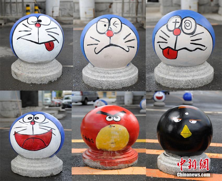 大學(xué)生が石にかわいいアニメキャラをペイント　吉林省