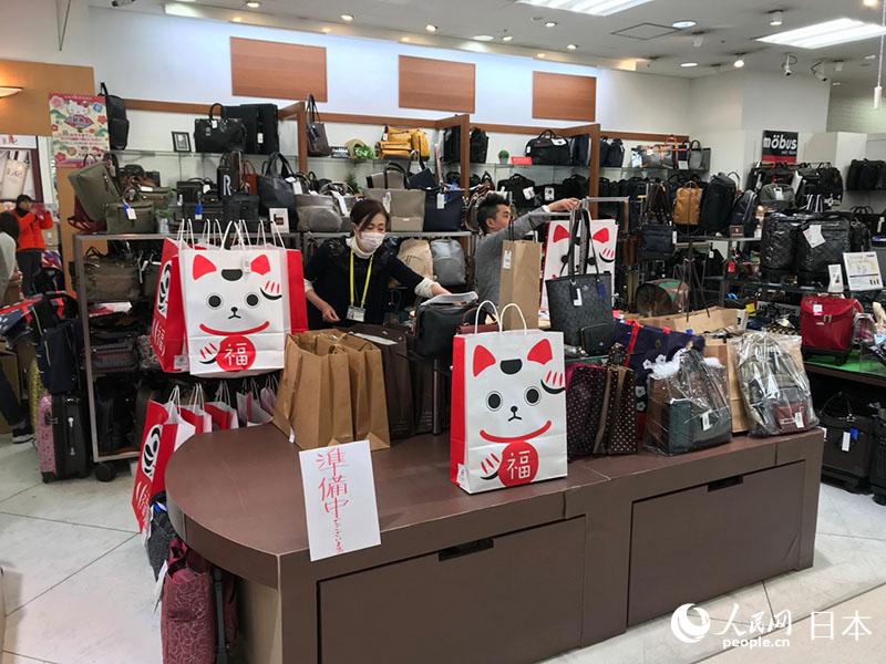 日本、熾烈な福袋商戦　今年は「體験型」が目玉