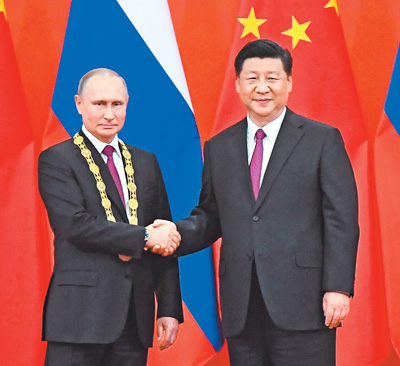 習(xí)近平國家主席が初めての友誼勲章をプーチン大統(tǒng)領(lǐng)に授與
