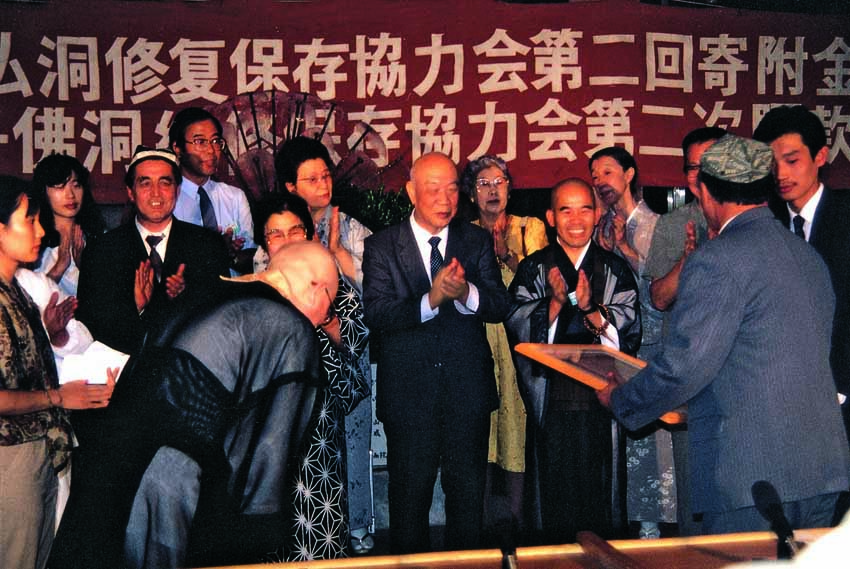 新疆を第二の故郷とし、改革開放以降の発展を見てきた僧侶?小島康譽氏