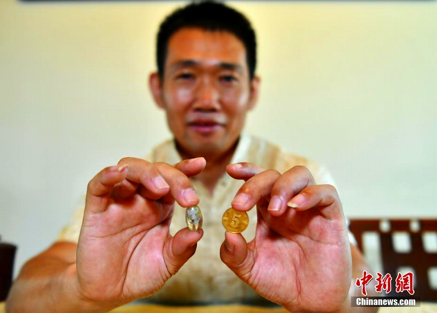 指先サイズの鼻煙壺に鳥167羽　「內(nèi)畫」の超絶技巧