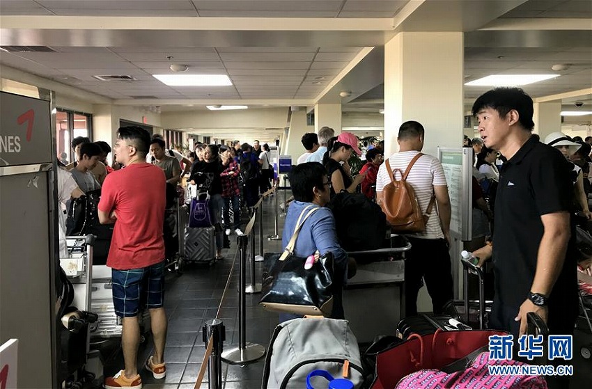 臺風26號でサイパンに足止めされていた中國人旅客第一陣295人が帰國