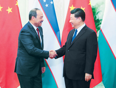 習(xí)近平國(guó)家主席は28日、ウズベキスタンのアリーポフ首相と人民大會(huì)堂で會(huì)談した（新華社?姚大偉記者撮影）
