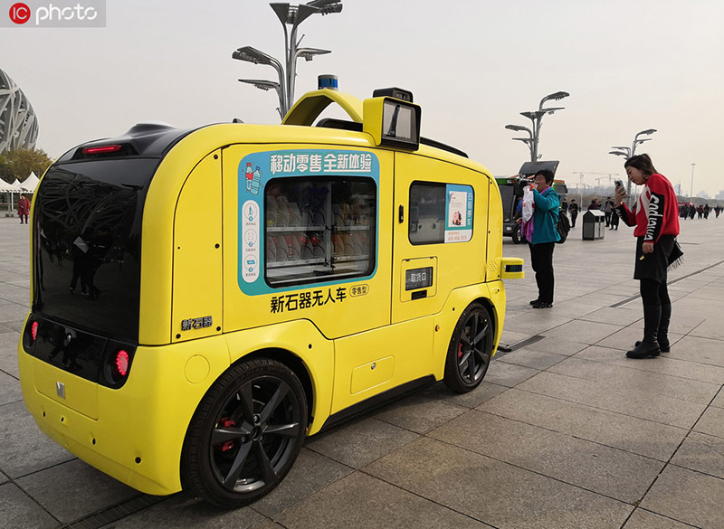 北京市の北京オリンピック公園に登場した無人の移動販売車（寫真著作権は東方ICが所有のため転載禁止）。