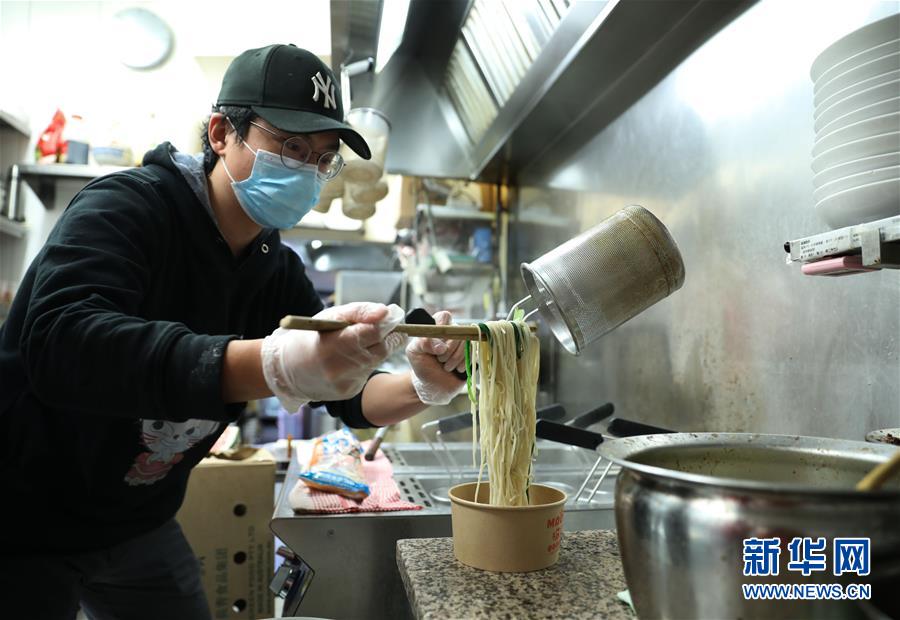 「団結(jié)して苦境を乗り越えよう」と呼び掛けるオーストラリアの華人レストラン