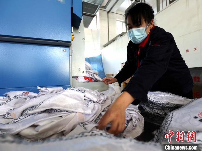 春運スタート　寢臺列車の寢具はどうやって洗い、消毒するのか？