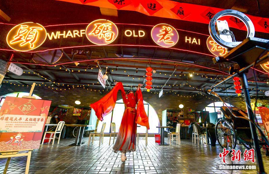 新疆ウルムチで民俗イベント「無(wú)形文化遺産で年越し」開催