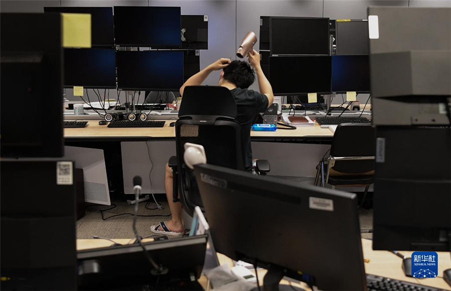 感染癥の中で持ち場(chǎng)を守る金融業(yè)界の人々　上海