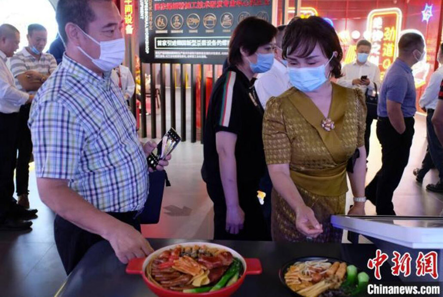 華僑のビジネスマンが広西特産のタニシ麺を視察　広西