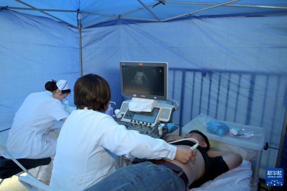 労働者に健康を?qū)盲堡胍苿?dòng)健康診斷カー　北京