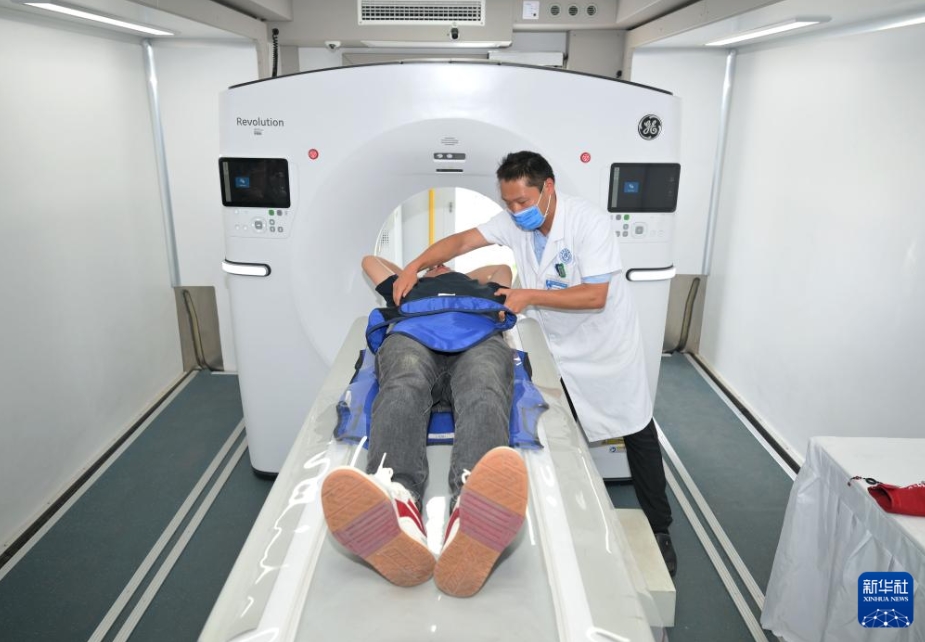 労働者に健康を?qū)盲堡胍苿咏】翟\斷カー　北京