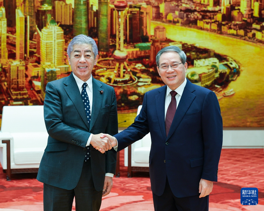 李強(qiáng)総理が日本の巖屋毅外相と會談