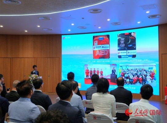 國航の社會貢獻(xiàn)を紹介する主催者（撮影?許可）。