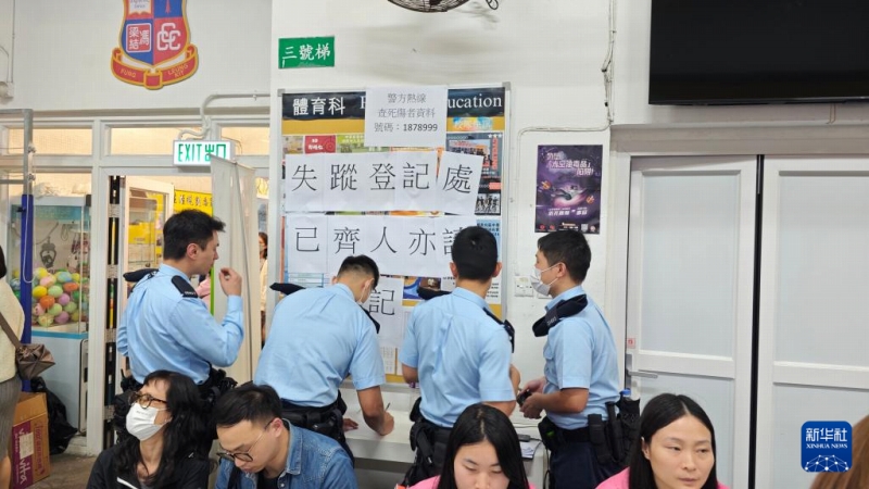 行方不明者の屆け出窓口で作業(yè)する警察官（11月26日撮影?陳鐸）。